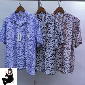Camisa de estampado de leopardo Hombres de alta calidad para mujeres camisas casuales