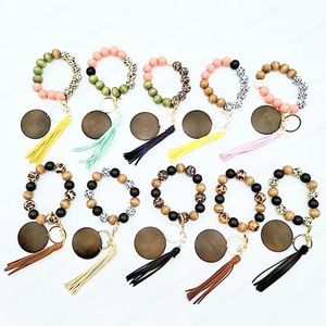 Porte-clés en perles de bois imprimé léopard, cadeau de fête, pompon en bois, Bracelet, porte-clés, dragonne, pour femmes et filles