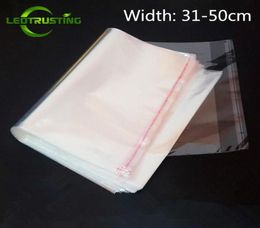 Leotrustage 100pcs 31-50cm de largeur RGE Clear Opp Adhesive Sac transparent Poly REABLEABLE SAG SAGE AUTO-PSTIC GADE