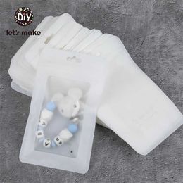 Laten we plastic zakken wit 100 stks (19.5x11.5cm) Display BPA Gratis Baby Toys Pakket Toon Punch Hanger Accessoires 211106