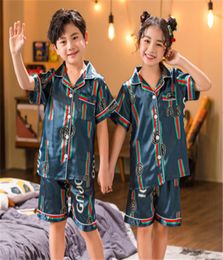 Lettre motif Kid039s pyjamas été nouveau Boy039s Girl039s à manches courtes pyjama costume enfants 039s à manches courtes maison Cl6211567