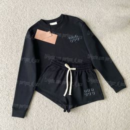 Cartas Mujeres pantalones cortos de sudadera con capucha negras Juego de manga larga de lujo