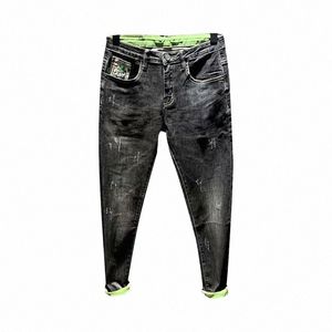 Pantalones LG Otoño Invierno Coreano Joker Pantalones casuales Niños Hombres Fi Marca Pies delgados Elástico Denim Street Wear Black Jeans Hombres I2Ye #