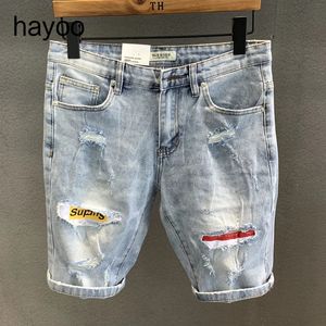 Lichtblauw gescheurde denim shorts heren zomer dunne slanke Koreaanse stijl trendy heren bijgesneden broek 240511