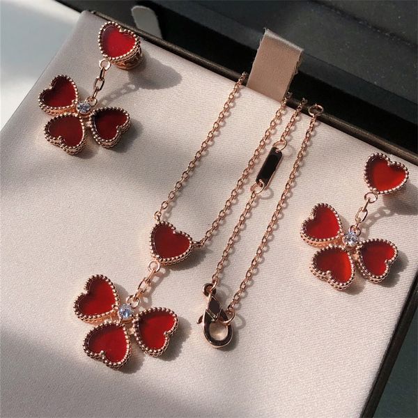 Colliers de créateurs de luxe légers, boucles d'oreilles, ensemble de bijoux en forme d'amour, chaîne dorée incrustée de diamants, accessoires disponibles en rouge et blanc zl179 I4