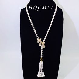 Collier multi-usages incrusté de zircon de fleur de pompon de luxe léger Designer français collier de perles d'eau douce naturelles femmes charme bijoux fille mode doux cadeau