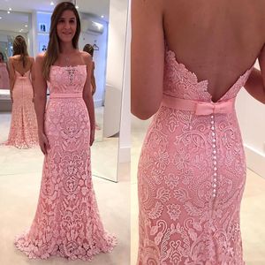 Robes de soirée rose clair sans bretelles en dentelle appliques robes de bal élégant sans manches dos couvert bouton sirène style balayage train robes de soirée