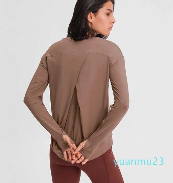 Ligne épissage sport à manches longues dessus de yoga vêtements de sport femmes couleur unie Simple loisirs dos pièce croix chemises d'intérieur