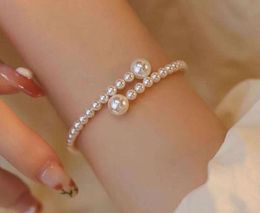 Link Armbanden Franse vintage parelarmband voor vrouwen licht luxe modeontwerper simple leuk