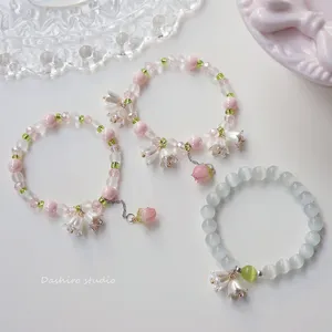Bracelets de liaison couleurs de gradient rose doux Lily de la vallée du pendentif élastique bracelet pour les femmes fille fleur de tulipe de mode printemps d'été
