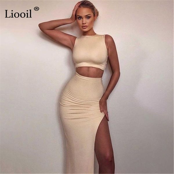 Liooil Negro Blanco Conjunto ajustado de dos piezas Camisetas sin mangas sexy y faldas con aberturas Sin mangas Cintura alta 2 piezas Trajes de fiesta Conjuntos de falda 210730