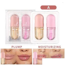 Brillant à lèvres 2pcs / Set Crystal Jelly Lèvres Plumper Huile Volume instantané Hydratant Réparateur Réduire Fine Line Y Enhancer Outil de maquillage Drop D Otbfx