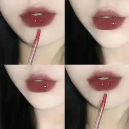 Film de brillant à lèvres formant un miroir de glaçage avancé hydratant et teinte de rouge à lèvres étudiant à l'eau