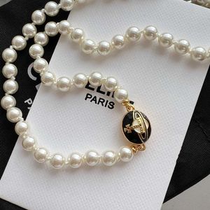 Lisa's même Vivian Vivienne impératrice douairière ouest saturne émail aimant boucle collier perle clavicule chaîne femme