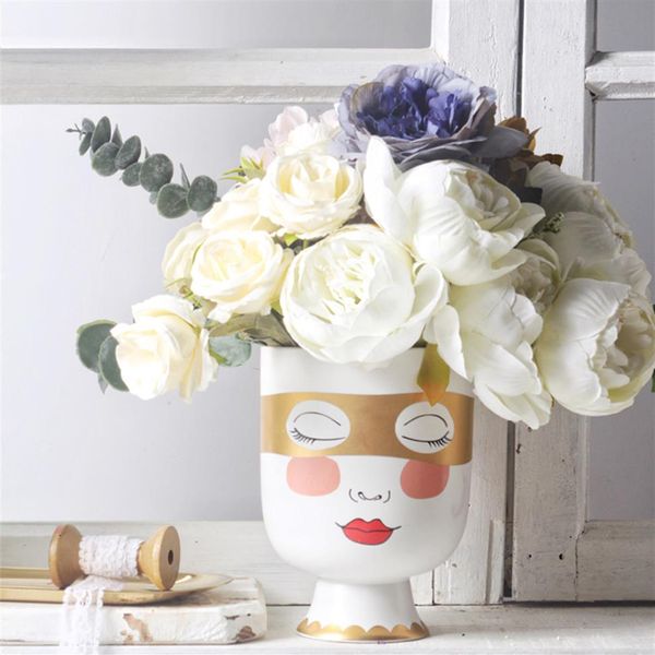 Petite fille tête mate table de fleur vase femme visage face au masque d'oeil doré arrangement de floraison grande bouche bouth pot bouteille décorative t298m