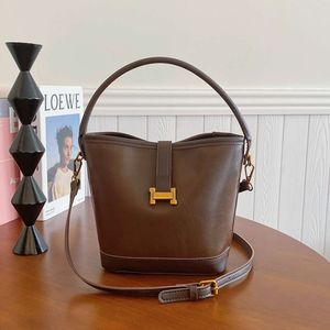 Live streaming Minimalistisch en high-end Nieuwe dames enkele schouder Internet Celebrity Bucket Crossbody Moedertas 2024 78% korting Winkel groothandel