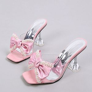 Liyke -stijl roze dames slippers sandalen mode parel bowknot hoge hakken pvc transparante schoenen zomer muilezel glijbanen pompen 230808