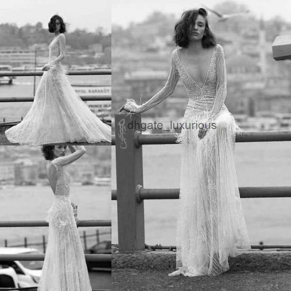 Liz Martinez Beach a ligne robes de mariée plume sans dos profond V couche en dentelle complète robes de mariée