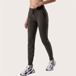 LL-2079 Pantalons Pantalons pour femmes Yoga Loose Neuvième Pantalon Excerise Sport Gym Running Casual Long Cheville Banded Pantalon Élastique Taille Haute Cordon