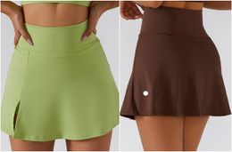 LL-6358 Tenue de yoga pour femmes taille haute jupes de tennis chaudes jupe d'exercice pom-pom girls robes courtes vêtements de fitness filles pantalons élastiques vêtements de sport doublés