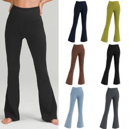 2024 Aligner les femmes Pantalons de yoga couleur Couleur solide sports nus Façon de taille évasée Fitness Loose Jogging Sportswear Womens Nine Point Fared Pant High Quality