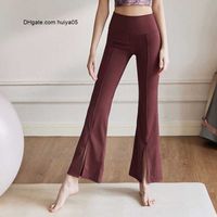 Ll pantalon féminin évasé de yoga à jambes larges de yoga pantalon sportif lâche inindustrie mince de gymnase à tube droit