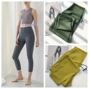 LL pantalon court taille haute pas de pantalon de Yoga ligne T Leggings coupe ajustée pantalon de survêtement couleur unie Nake Feeling Capris femmes élastique serré