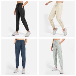 LL Joggers YOGA Lichtgewicht workout-joggers voor dames Hoog getailleerde outdoor hardloop-casual trainingsbroek met zakken