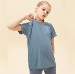 LL Chemises de yoga pour enfants à manches courtes pour filles Col rond Respirant Sans couture Séchage rapide Enfants Fintness Sports T-shirt d'été ll23208