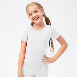 LL Camisas de yoga para niños Camiseta corta para niñas Nacrol en el cuello transpirable sin costura para niños secos Deportes Sports Summer T Shirt LL23207