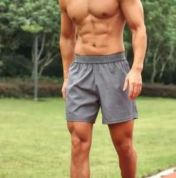 LL hombres pantalones cortos deportes al aire libre fitness secado rápido yoga masculino color puro entrenamiento montaña correr elástico pantalones sólidos pantalones 2 bolsillos laterales popular