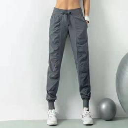 Ll pantalones de trote de yoga para mujeres Pantalones de chaqueta sueltos Velocidad de ejercicio de fitness para mujeres Jogigador seco corriendo estiramiento del pie delgado