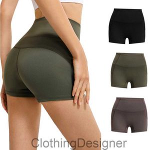 Ll Femmes Yoga Leggings High Taist Leveting Hip Shorts Honey Peach Hips Pas de fil de gymnase élastique serré 3/4 Shorts
