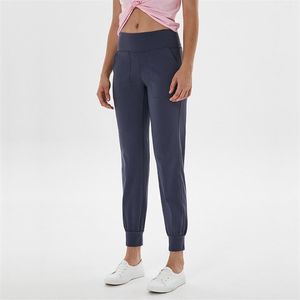 LL Mujeres Traje de yoga Correr Joggers Entrenamiento casual Pantalones elásticos de secado rápido para ejercicio físico Gimnasio Pantalones de chándal para correr 7 colores 219V