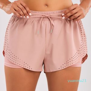 LL Women Yoga Shorts Outfits Hoge taille Sportkledingoefening met zakken dragen korte broek meisjes die elastisch zijn met elastiek.
