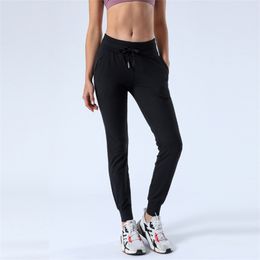 LL femmes nouveaux vêtements de Yoga tirer corde extensible taille haute sangle Jogging pantalons de survêtement sport Fitness pantalons décontractés