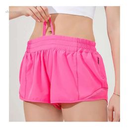 LL Womens Yoga Shorts atuendos con ejercicio Fiess Wear lu Short Girls Running Pants de elástica Sportswear Pockets Lu123