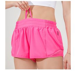 LL dames yoga shorts outfits met oefening fiess slijtage lu korte meisjes lopen elastische broek sportkleding zakken lu88248