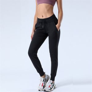 LL Yoga Wear Pantalones de jogging para mujer, listos para tirar de la cuerda, pantalones con correa de entrenamiento y bolsillo