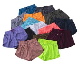 LL601 Hot Low Rise Shorts Ademende, sneldrogende yogashorts Ingebouwde gevoerde sportshort Verborgen ritssluiting Zijzakken Hardlooptrainingsbroek met doorlopend trekkoord