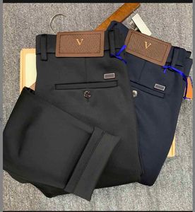 Lll Designer Men's Khaki Business Automne Hiver 2023 Pant de mode Pantal Couleur solide pantalon décontracté à jambe droite en gros bleu noir