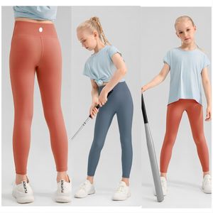 LLNew Hot selling meisjes zomer lichtgewicht ademende yogabroek zonder lastige draad, zachte en huidvriendelijke strakke sportbroek voor kinderen