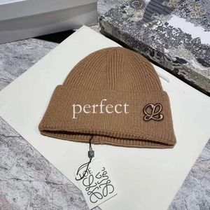 Loewee Hat Haute Qualité Designer Beanie Caps Hommes Femmes Hiver Populaire Laine Chaud Tricot Chapeau Nouvelle Mode Beanie Bobbles Designer 595