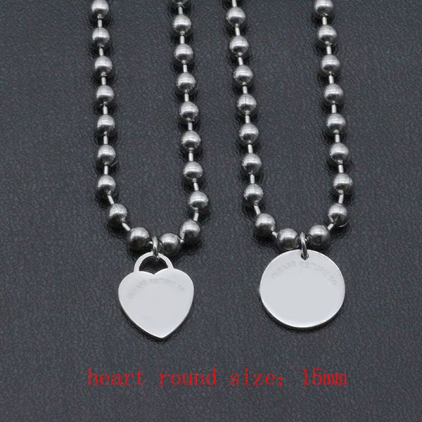 Logotipo Collares de corazón de lujo Mujeres Joyas colgantes redondas de acero inoxidable en el cuello Día de San Valentín Regalos para la novia Accesorios al por mayor