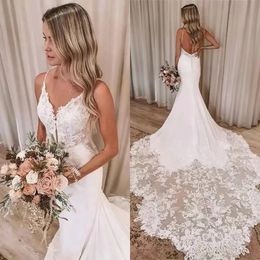 Longue robe de mariée sirène en dentelle avec train Boho, bretelles spaghetti, col en V, robes de mariée en satin ivoire, robes de mariée sexy de plage d'été 2024 es