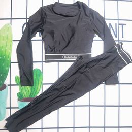 Zwarte yoga-outfits met lange mouwen, trainingspak voor dames, gewatteerde luxe designer sportkleding, elastische trainingspakken met taille, yoga-tops, leggings