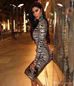 à manches longues à manche haute léopard imprimé sexy bodycon mini robe 2020 automne hiverne femme mode de Noël vêtu 8144250