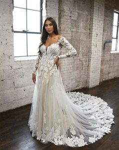 Manches longues en dentelle appliques robe de mariée A-ligne Boho plage robes de mariée été 2023 Sexy dos nu pays robes de mariée doublure en champagne sur mesure