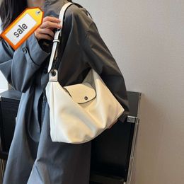 Longxiang sac femmes nouvelle épaule Simple et polyvalent déplacements grande capacité Hobo mode étudiant salle de classe