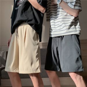 Pantalones cortos de seda de hielo casuales sueltos pantalones machos de secado para hombres de verano pantalones de color sólido